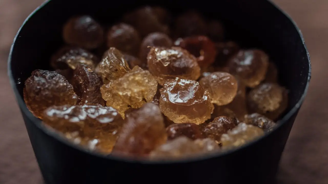 Amber botanical concentrate crystals and high purity hydrocarbon extract